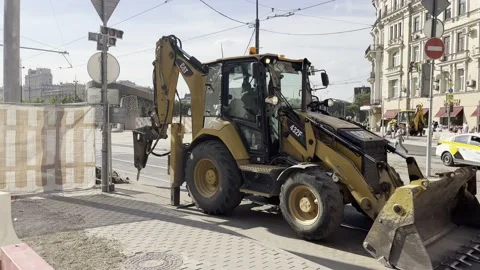 Tractor repairs the road Stock Footage 204121157