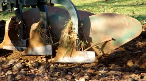 The tractor is reversing back and is about to plow land Stock Footage 57300421