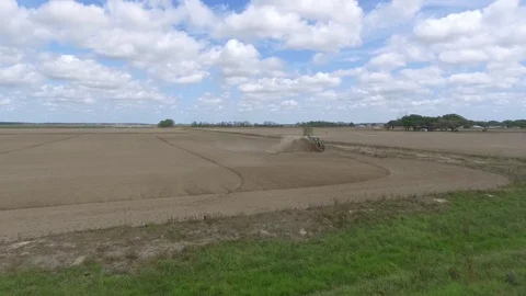 Tractor in rice fields Stock Footage 92371962