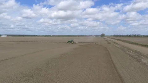 Tractor in rice fields Stock Footage 92373050