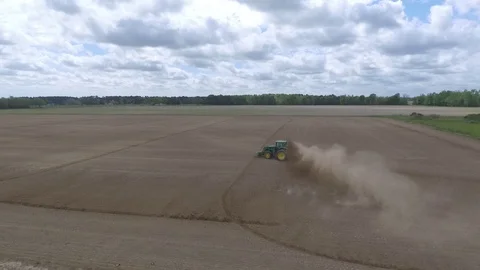 Tractor in rice fields Stock Footage 92374189