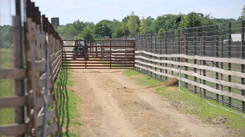 TRACTOR RIDES ON A FARM Stock Footage 158127388