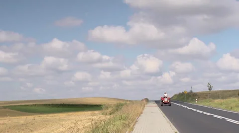 Tractor on the road Stock Footage 30778943