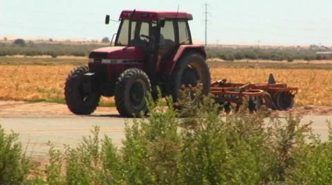 Tractor On Road In Imperial Valley Stock Footage