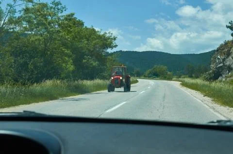 Tractor on a road Stock Photos