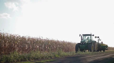 Tractor on the road with seeding carriage Stock Footage 54904214