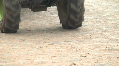 Tractor on the road in the village Stock-Footage 38746496