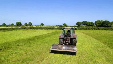 Tractor Rolling, close rear, slow orbit Stock Footage 243029718