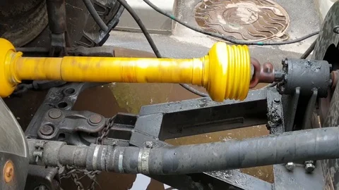 Tractor rotating PTO shaft Stock Footage 114064979