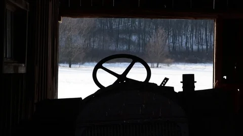 Tractor in rural barn Stock Footage 100692513