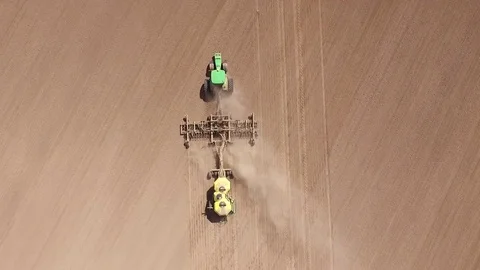 Tractor with a seeder Stock Footage 83624416