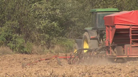 Tractor seeder turns in the field Stock-Footage 36993346