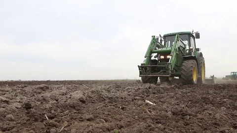 Tractor seeding close the ground Stock Footage 82701434