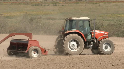 Tractor Seeding Soil On Farm Stock Footage 68165912