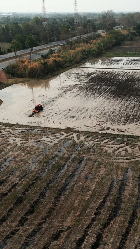 A tractor seen from the sky in Thailand Stock-Footage 265491825