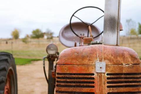 Tractor sitting wait ing for use Stock Photos