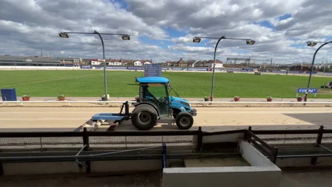 Tractor Smoothing Sand At A Greyhound Track Stock Footage 237002865