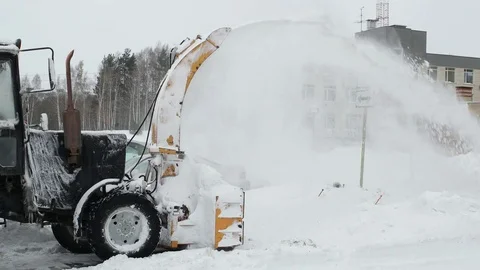 Tractor snow blower after a snowstorm. laterally Stock Footage 70390901