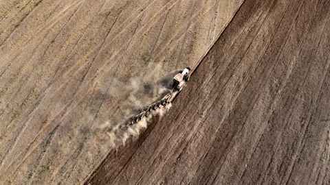 Tractor on Soil cultivation at field. Disk harrow on plowing field. Stock Footage 220102702