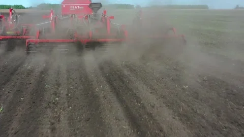 Tractor with sowing complex works in the field Stock Footage 130521521