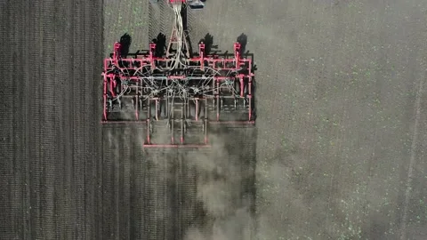 Tractor with sowing complex works in the field planting crops Video stock 130523565