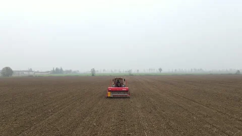 Tractor Sowing on a Field #4 Stock Footage 145958318