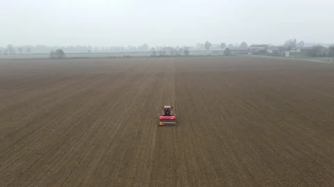 Tractor Sowing on a Field #5 Stock Footage 145957011