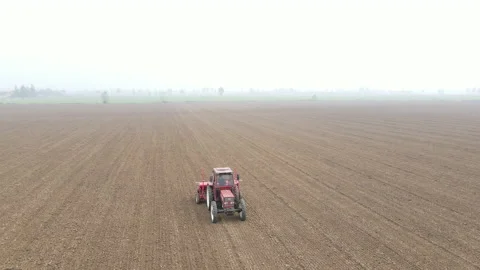 Tractor Sowing on a Field #6 Stock Footage 145958782