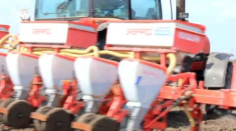 Tractor with sowing machine unfolds Stock Footage 62338812