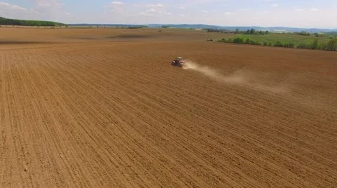 Tractor sowing seeds of corn. Stock Footage 63317651