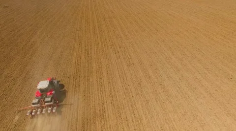 Tractor sowing seeds of corn. Stock-Footage 63317963