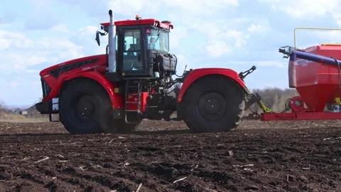 Tractor sows in the field. Video stock 227572562