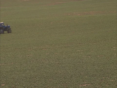Tractor spray fields Stock Footage 2334247