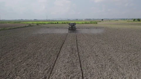 Tractor spraying fields in spring, Piedmont countryside Stock Footage 311024809