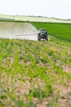 Tractor spraying Stock Photos