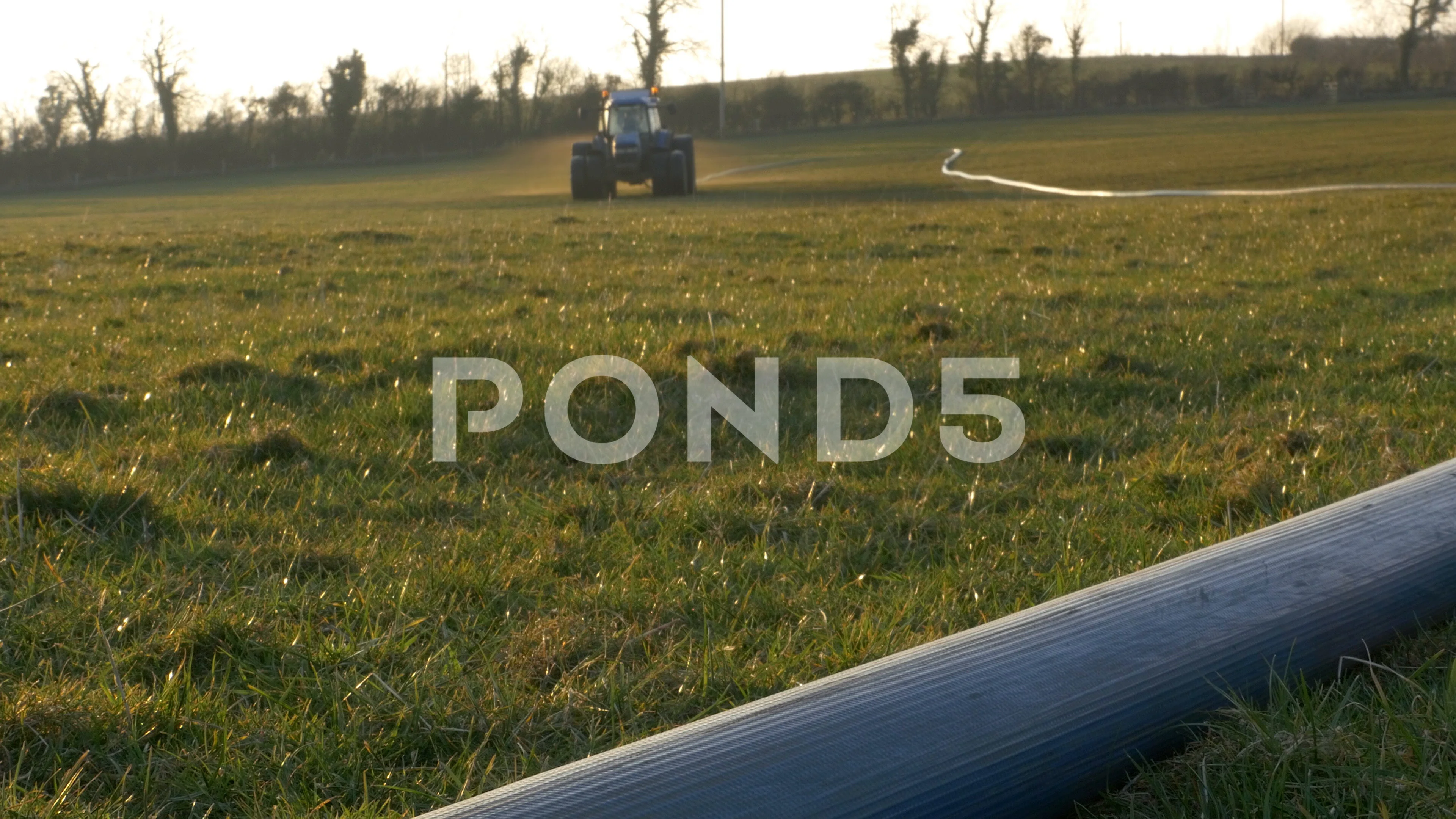 Tractor Spreads Slurry in Field County F, Stock Video