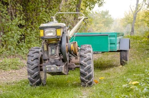 Tractor standing in the park Stock Photos