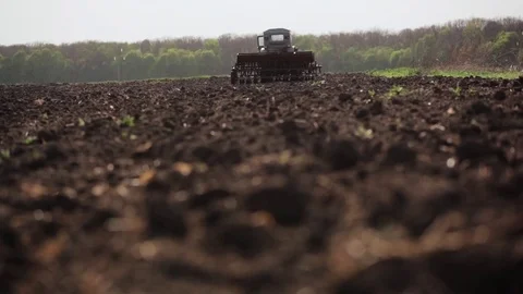 The Tractor Stands Among the Fields Stock Footage 75174962