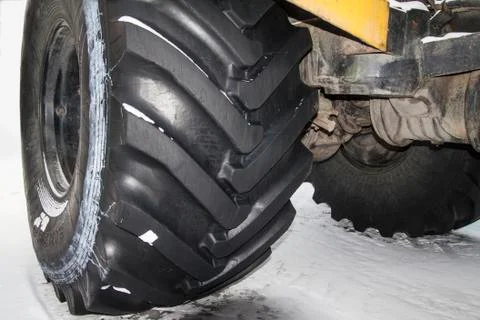 Tractor stands on the snow Stock Photos