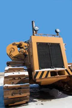 Tractor stands on the snow Stock Photos