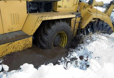 Tractor stuck in the mud Stock Photos