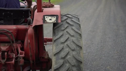 Tractor tire rolling in slow motion Stock Footage 87269251