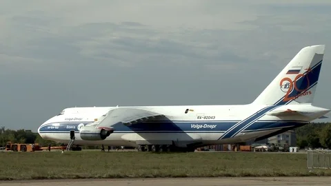 Tractor towing  An-124 heavy long-range transport aircraft 4th generation. Stock Footage 107584397