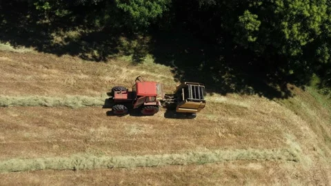 Tractor Tracking, Top View, Doing Round Ballers Stock Footage 144540566