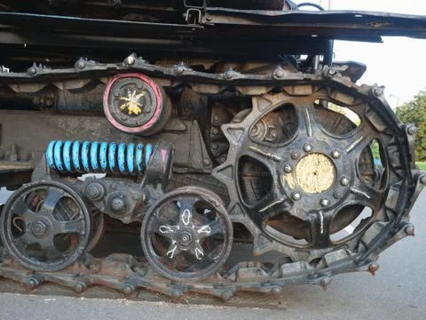 Tractor tracks colored by chalks, old mechanics in new colors Stock Photos