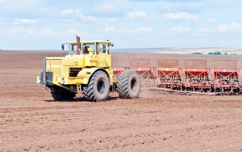 Tractor with trailed planter Stock Photos