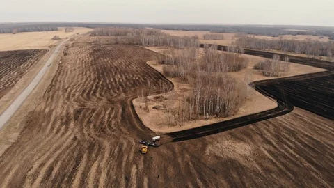 Tractor trailer fertilizes the ground Stock Footage 94707635