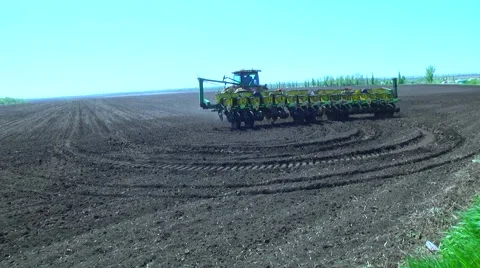 Tractor trailer handles field Stock Footage 61074927
