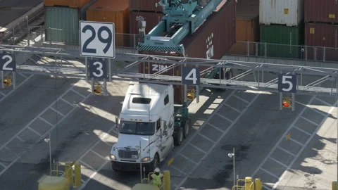 Tractor trailer receiving cargo container Stock Footage 171591532