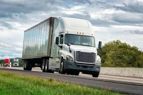 Tractor Trailer Rig On The Interstate Stock Photos